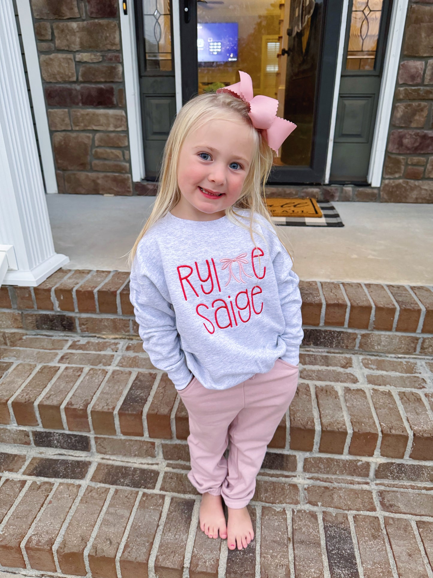 RED + PINK BOW CREWNECK - ETA: 4 weeks