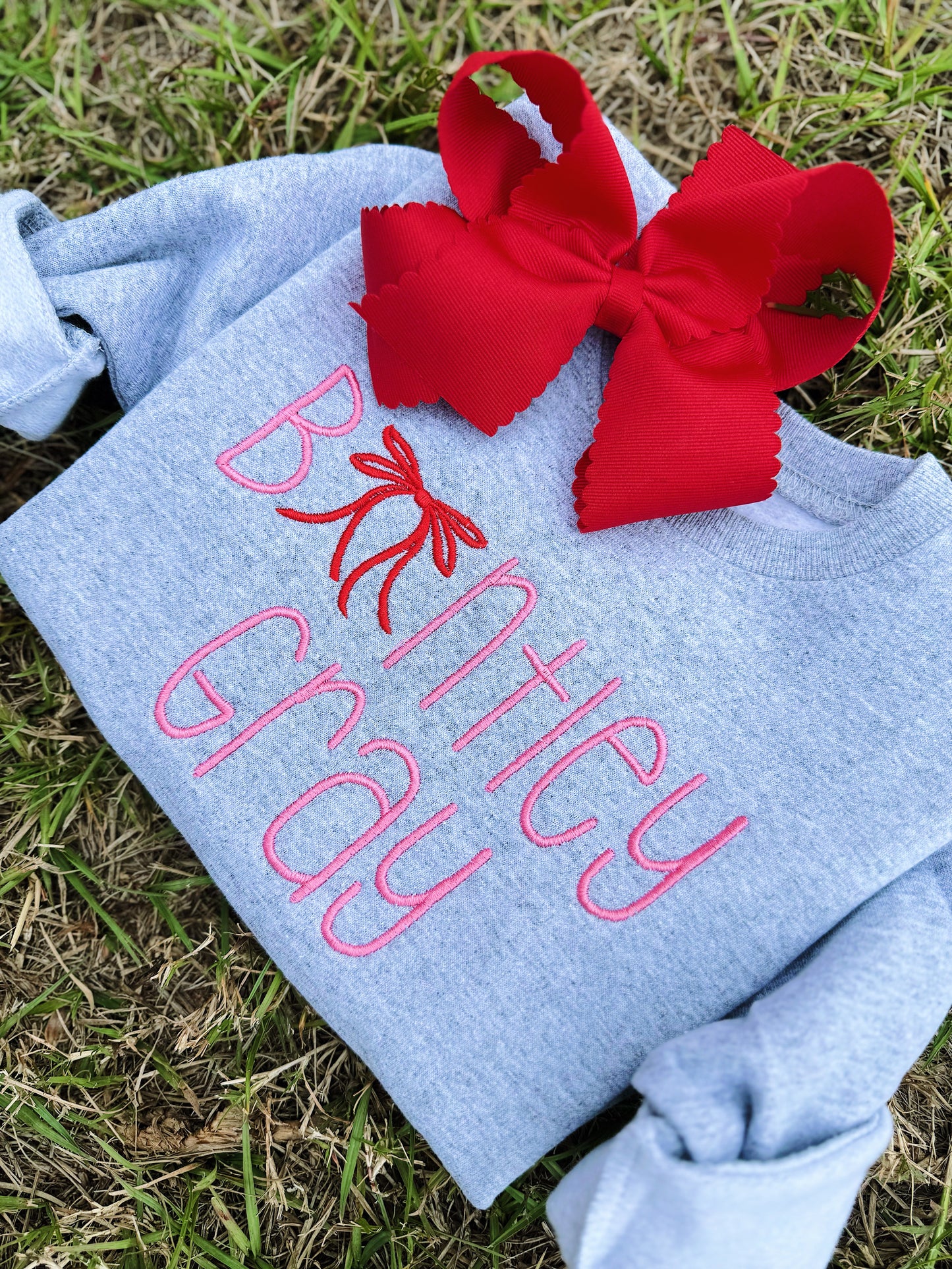 PINK + RED BOW CREWNECK - ETA: 4 weeks